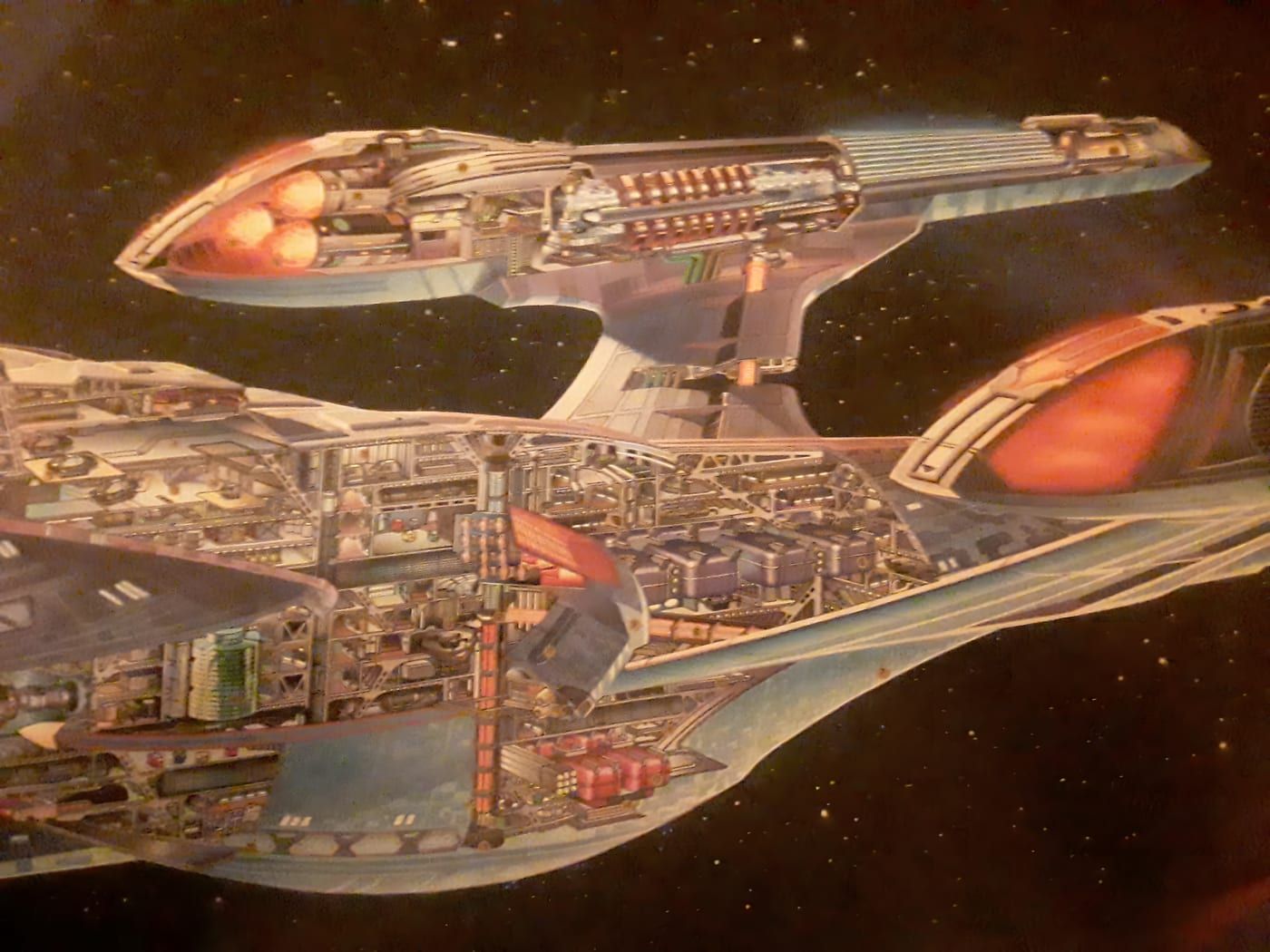 USS Enterprise-E Sovereign-class cross-section schematic showing primary hull, saucer, nacelles, and internal deck arrangement.