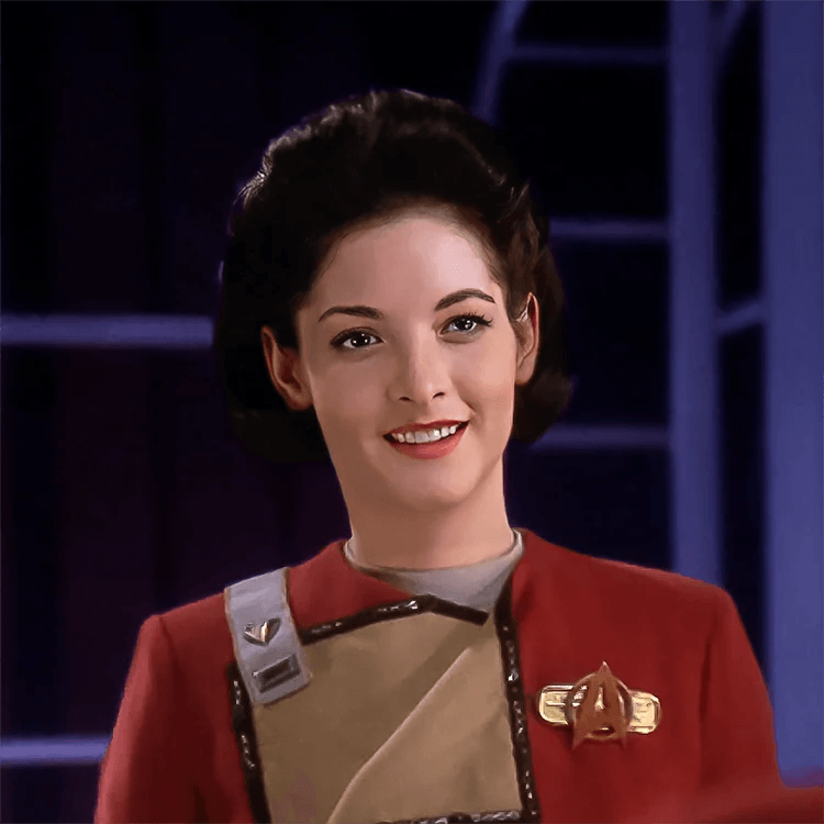 Marta Batanides in a Starfleet cadet-era uniform.