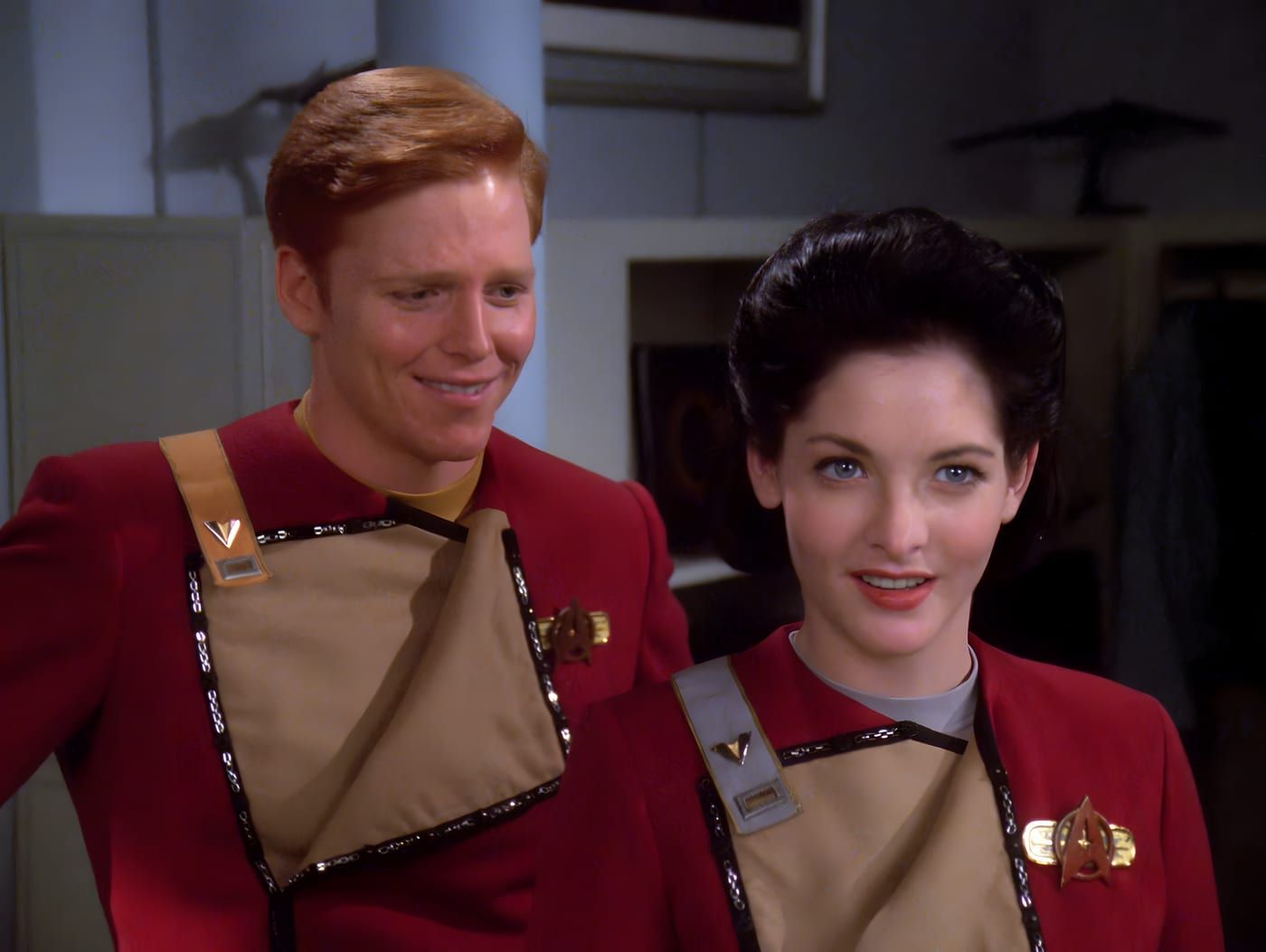 Marta Batanides standing beside Cortan Zweller in Starfleet cadet-era uniforms.