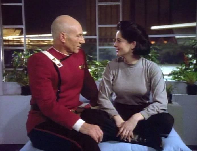 Young Jean-Luc Picard sitting beside Marta Batanides.