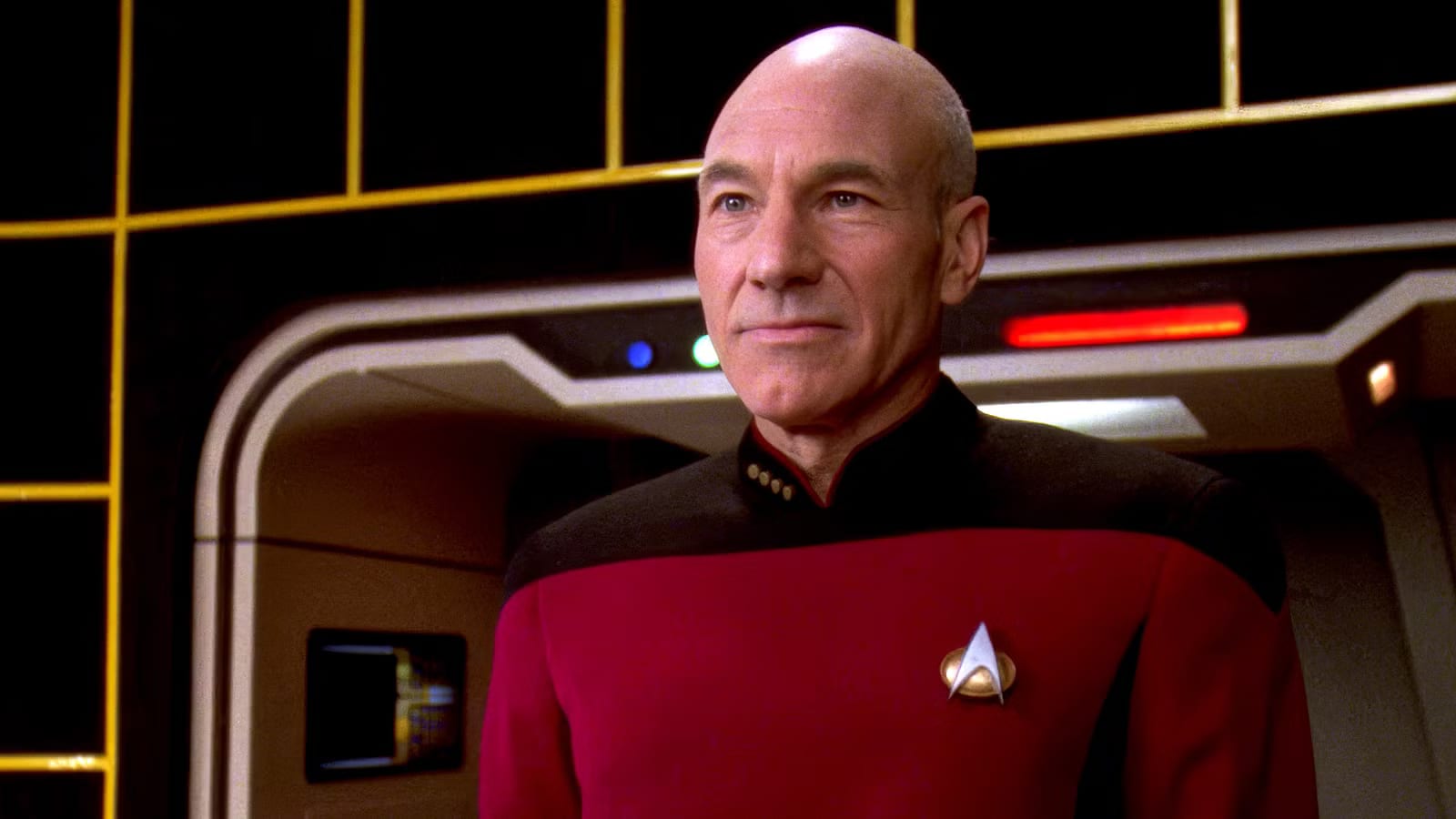 Captain Jean-Luc Picard in Starfleet command red, in a holographic-style portrait.