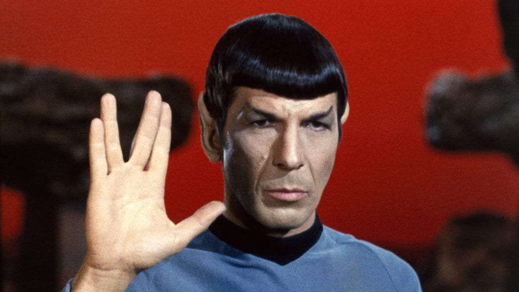 Spock raising his hand in the Vulcan salute.