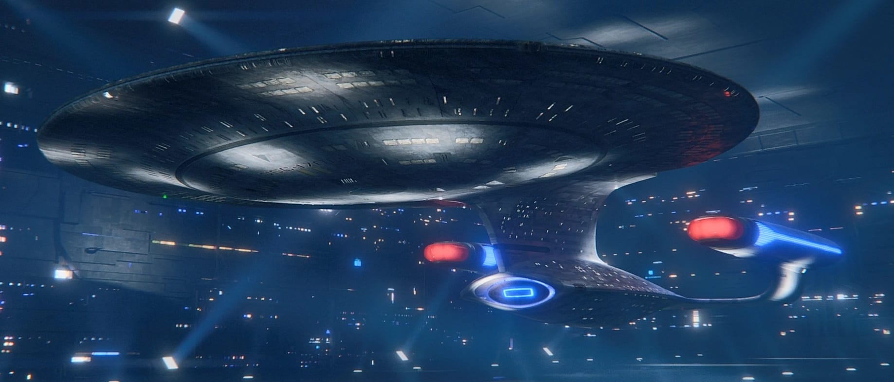 USS Enterprise-D above a planet.