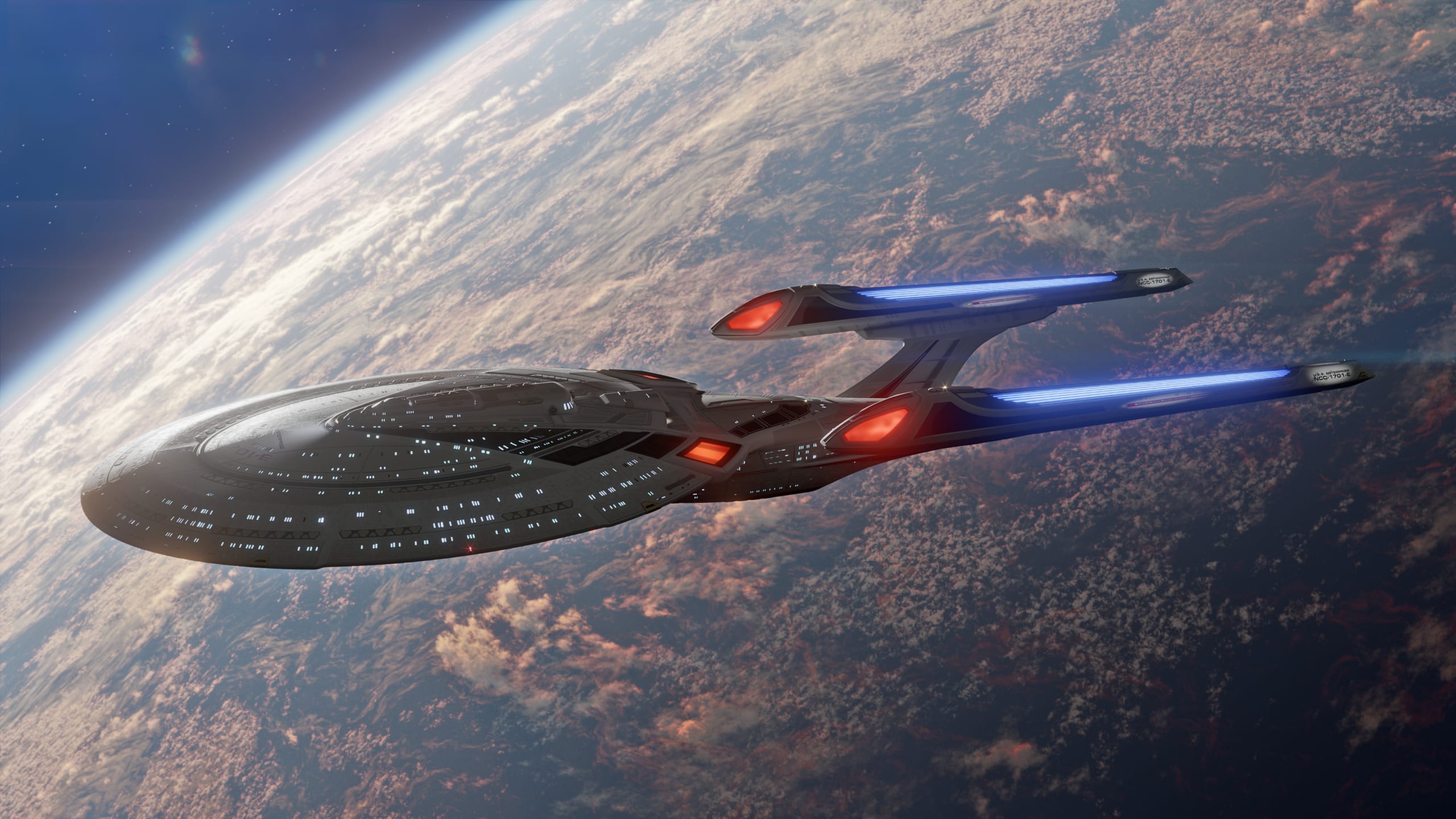 USS Enterprise-E above a planet.